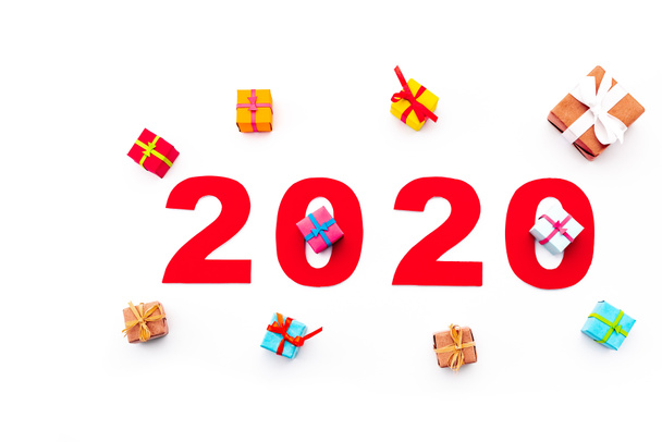 top view of red 2020 number and gifts isolated on white - Photo, image