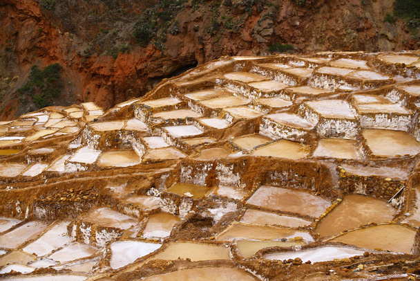 A view of the terraces and salt pools of Maras Salt Mines which is situated in Sacred Valley of Peru.  - Photo, Image