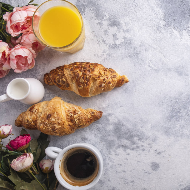Healthy breakfast concept. Beverages and  fresh croissants . Top view. Copy space - Fotografie, Obrázek