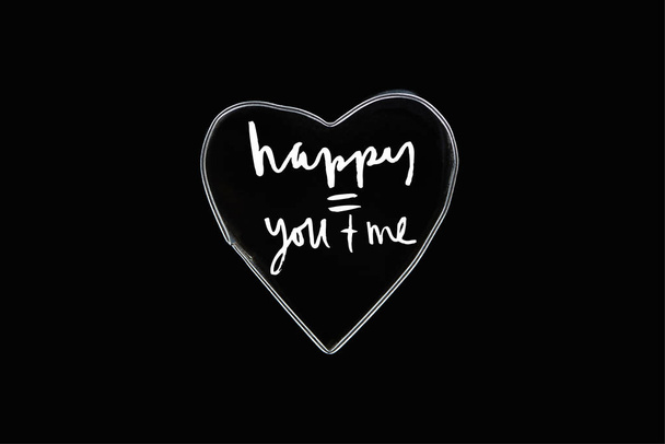 Top view of metal wire in heart shape isolated on black with happy you and me lettering - Foto, imagen