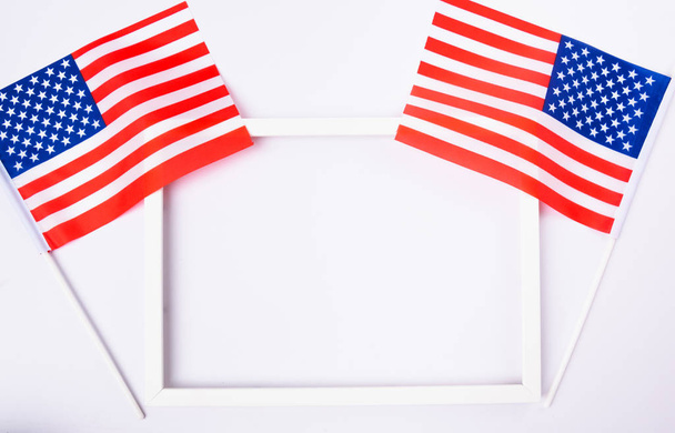 Martin luther king day, flat lay top view, American flag and photo frame on white background with copy space for your text - Foto, Imagen