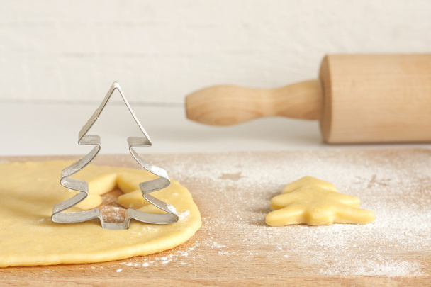 Christmas baking food concept with tree and dough - Foto, Imagem