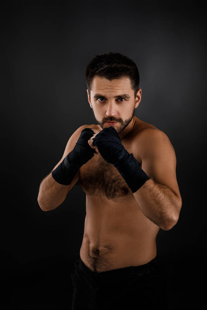 Muscular boxing man ready to fight. - Фото, зображення