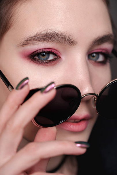 close-up photo of gorgeous girl in sunglasses - 写真・画像
