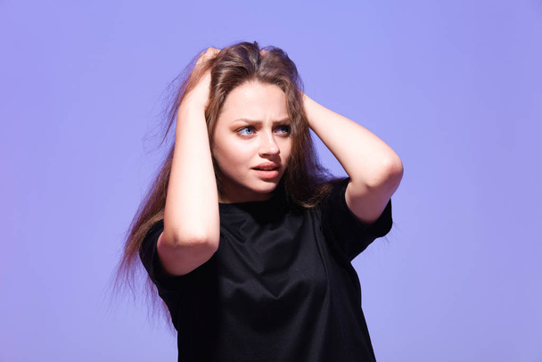 studio shot of young stressed woman  - Photo, Image
