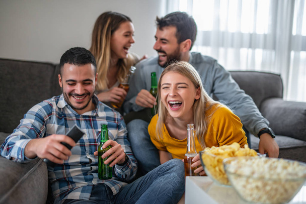 Friends watching  football game together - Photo, Image