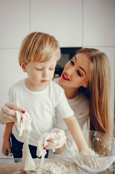Family cook the dough for cookies - 写真・画像