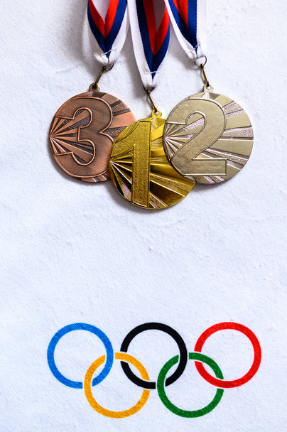 TOKYO, JAPAN, JANUARY. 20. 2020: Gold silver and bronze medal, victory concept photo, white edit space - Foto, Imagen