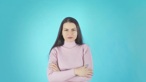 Young Confused Lady Standing Isolated Over Blue Background Looking Camera - Filmati, video