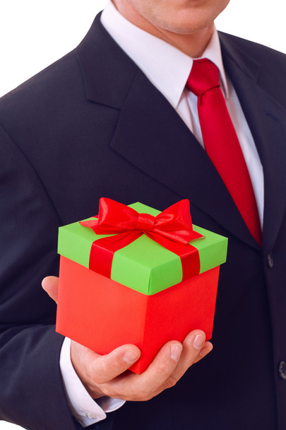 businessman holding red gift box - Foto, Bild
