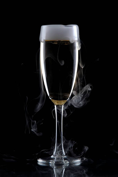 Glass of wine isolated over black background - Foto, immagini
