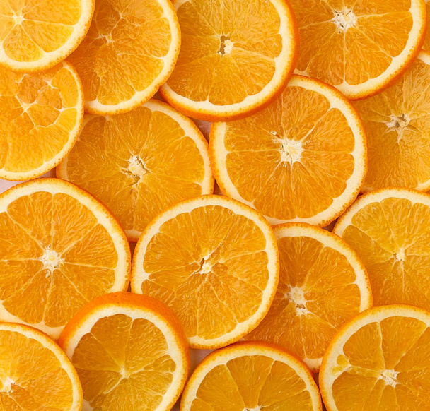 texture of round slices of ripe juicy orange. Organic food frame - Photo, Image