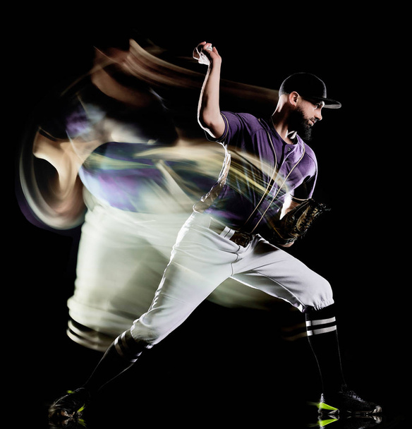 baseball player man isolated black background light painting - Foto, afbeelding