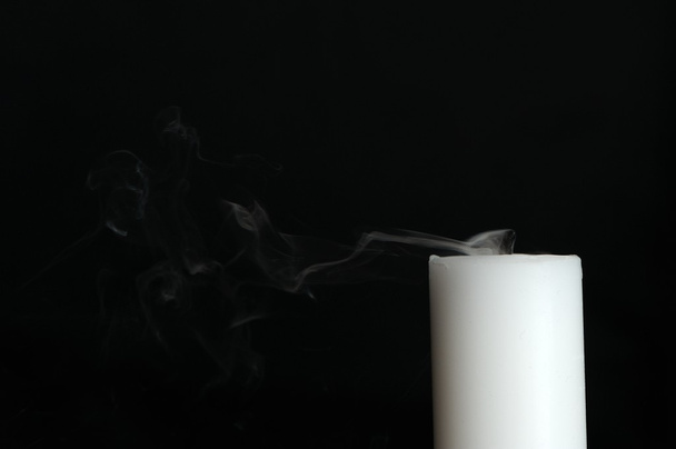 Smoke Coming from Candle on Black Background with Copy Space - Foto, imagen