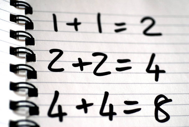 numbers and mathematical formulas on a notebook - Photo, Image