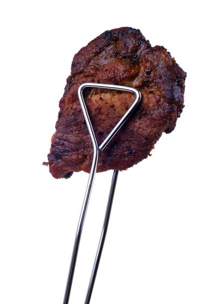 grilled meat on a white background - Foto, Imagen