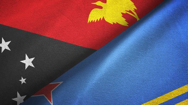Papua Yeni Gine ve Aruba iki bayrak tekstil kumaşı, kumaş dokusu - Fotoğraf, Görsel