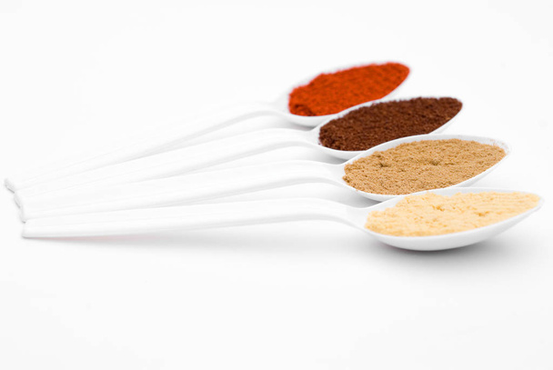 delicious variety of spices, closeup view - Фото, изображение