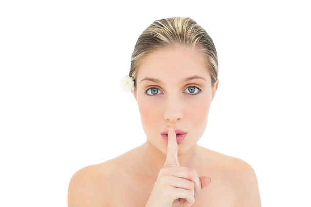 Serious fresh blonde woman asking for silence - Photo, Image