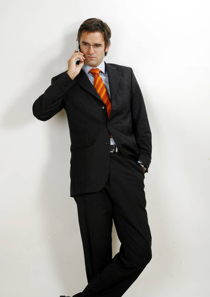 portrait of a handsome young businessman in a suit and tie - Fotó, kép