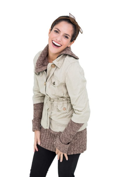 Laughing cute brunette in winter fashion posing for camera - Photo, Image