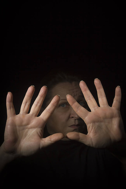 Woman shows hands stop gesture - Photo, image