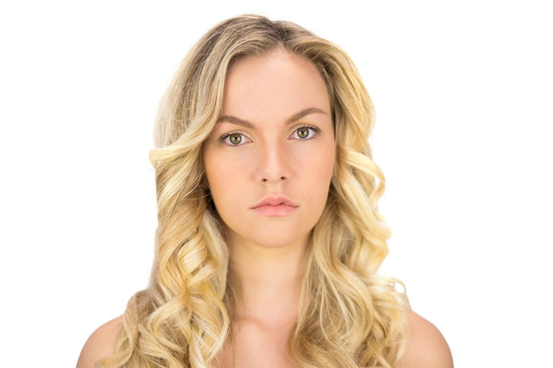 Serious curly haired blonde posing - Fotó, kép
