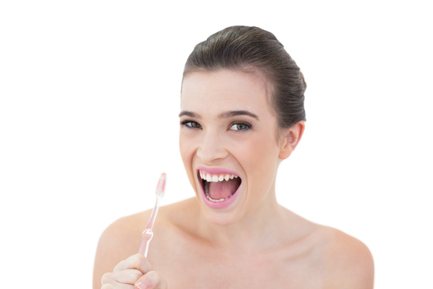 Cute model using a toothbrush - Valokuva, kuva