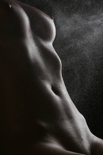 naked female body on black background - Zdjęcie, obraz