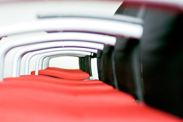close up of a row of red seats in the store - Valokuva, kuva