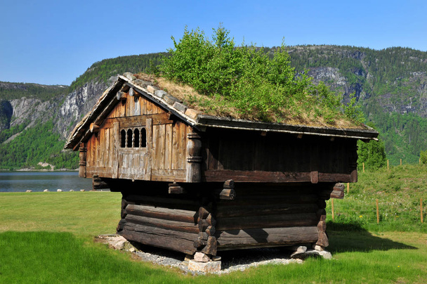 typical wooden house in norway. it will be a storage shed. - Zdjęcie, obraz