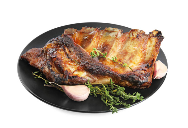 Tasty grilled ribs with thyme and garlic isolated on white - Foto, Imagem