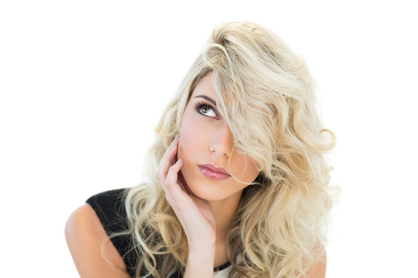 Thoughtful gorgeous blonde model looking up - Fotografie, Obrázek
