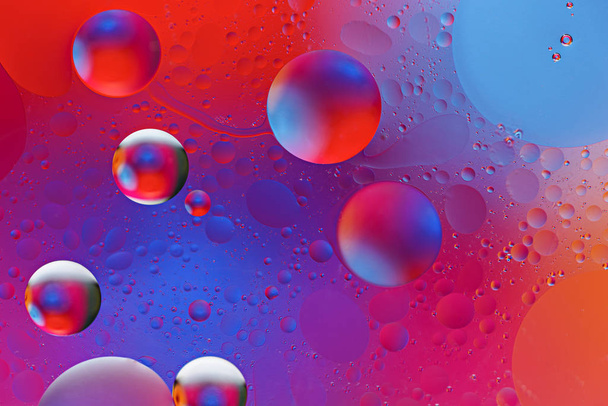 colored neon bubbles on gradient background - Foto, imagen
