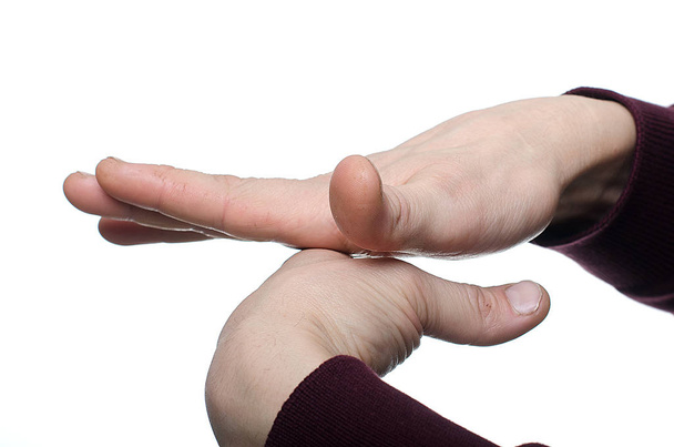 un homme joue avec ses doigts
 - Photo, image