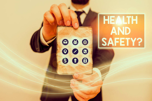 Πινακίδα κειμένου που δείχνει την ερώτηση υγείας και ασφάλειας. Κανονισμοί και διαδικασίες για τις επιχειρηματικές φωτογραφίες για την πρόληψη ατυχημάτων ή τραυματισμών - Φωτογραφία, εικόνα