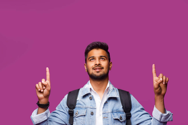 Cute indian man on violet background - Foto, afbeelding