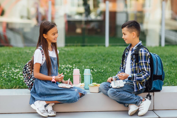 children during lunch outdoors, selective focus - Fotografie, Obrázek