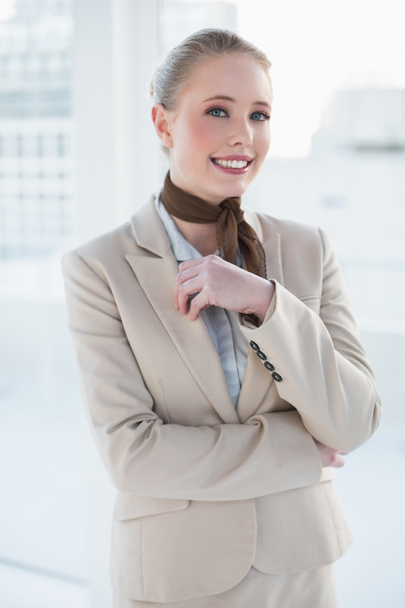 Blonde smiling businesswoman looking at camera - Фото, зображення