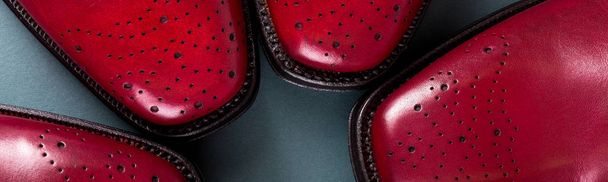 Banner of Red oxford shoes on blue background. - Photo, Image