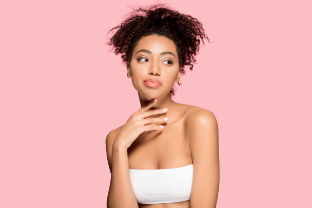portrait of attractive african american girl with clean face, isolated on pink - Photo, Image
