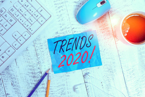 Handwriting text writing Trends 2020. Conceptual photo general direction in which something is developing or changing technological devices colored reminder paper office supplies keyboard mouse - Foto, Bild