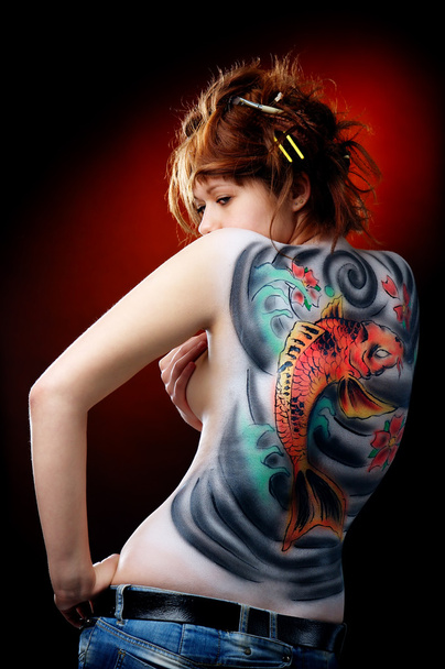 The girl and the red carp (body art) - Foto, Imagen