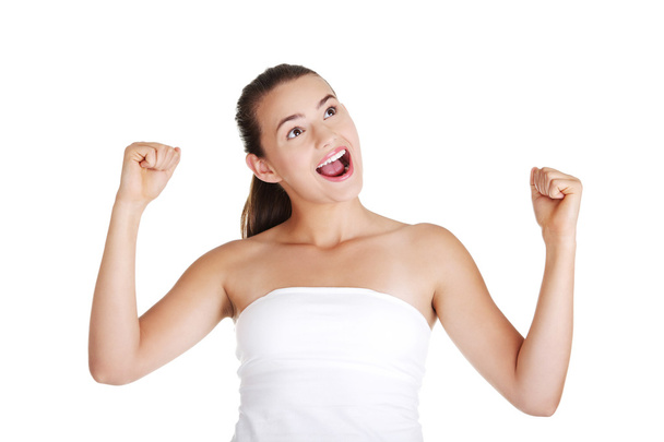Excited teen woman with fists up - Photo, Image