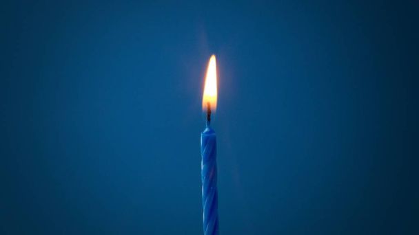 one candle light on blue - Photo, Image