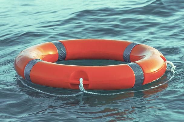 Orange lifebuoy pool ring float - Photo, Image