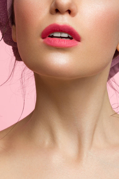 Close-up perfect lip makeup beautiful female mouth. Plump sexy full lips. Macro photo face detail. Perfect clean skin, fresh lip make-up. Sweet pink lipstick, magenta color. Valentine's day style - Photo, Image