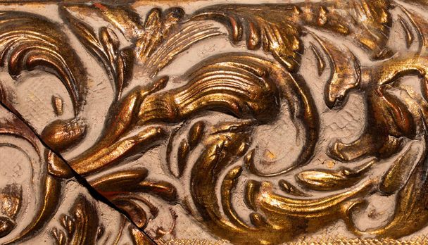 Detail des ornamentalen Bilderrahmens, Bronzefarbe. - Foto, Bild