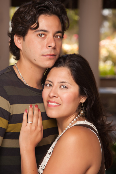 Attractive Hispanic Couple Portrait Enjoying Each Other Outdoors. - Foto, Imagen
