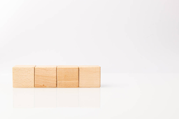 wooden cubes on a white background  - Foto, Imagen